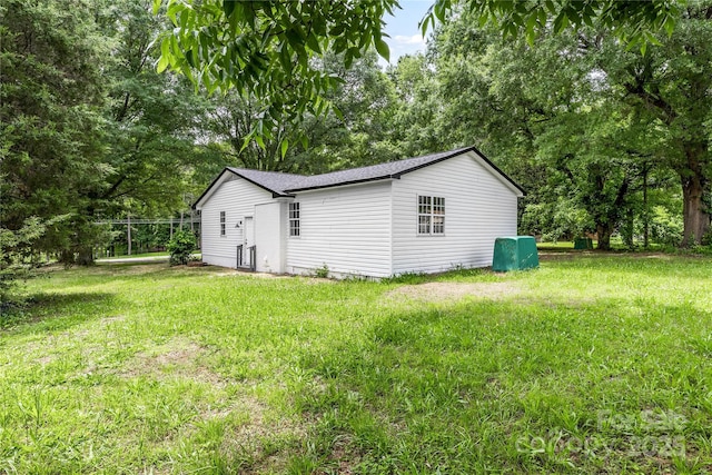 2280 Cannon Farm Rd, China Grove, NC 28023 - view of property exterior featuring a lawn and roof with shingles