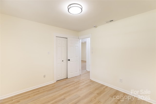 2280 Cannon Farm Rd, China Grove, NC 28023 - spare room featuring baseboards and light wood finished floors