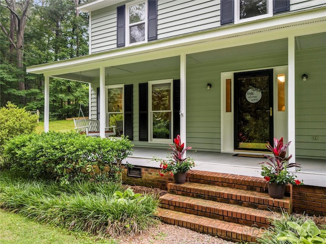 4848 Spicewood Dr, Charlotte, NC 28227 - doorway to property featuring a porch