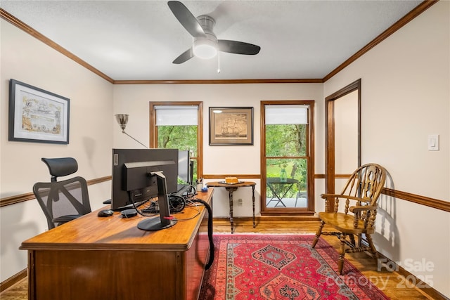 4848 Spicewood Dr, Charlotte, NC 28227 - office area with plenty of natural light, wood finished floors, crown molding, baseboards, and ceiling fan