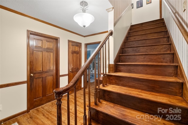 4848 Spicewood Dr, Charlotte, NC 28227 - staircase featuring wood finished floors and ornamental molding