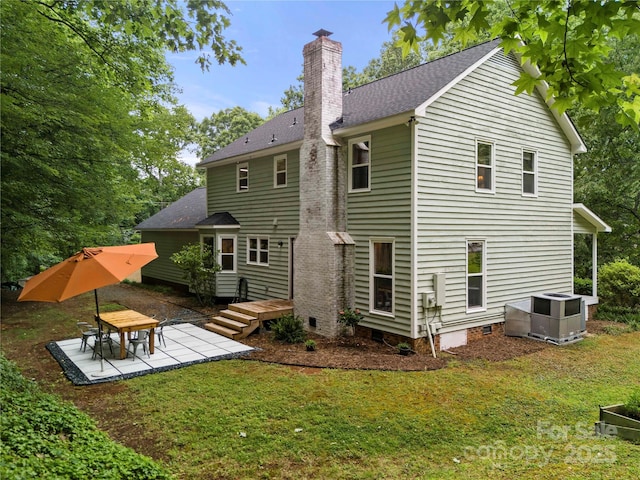 4848 Spicewood Dr, Charlotte, NC 28227 - back of property featuring crawl space, a chimney, central air condition unit, a lawn, and a patio