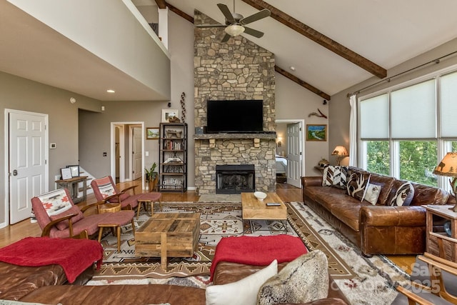 28 Mountain Vista Dr Unit 1 & 2, Asheville, NC 28804 - living area featuring a ceiling fan, wood finished floors, beam ceiling, a stone fireplace, and high vaulted ceiling