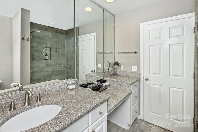 28 Mountain Vista Dr Unit 1 & 2, Asheville, NC 28804 - full bathroom with a shower stall, vanity, wood finished floors, and recessed lighting