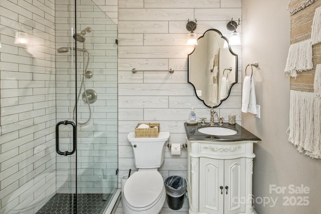 28 Mountain Vista Dr Unit 1 & 2, Asheville, NC 28804 - full bathroom featuring vanity, a stall shower, and toilet