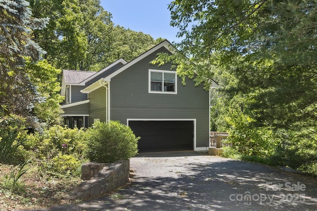 28 Mountain Vista Dr Unit 1 & 2, Asheville, NC 28804 - view of side of home with driveway and a garage