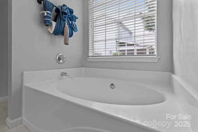 8906 Pickering Grove Ln, Charlotte, NC 28216 - full bathroom with a garden tub and tile patterned floors