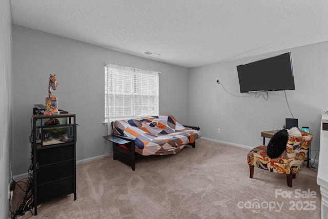 8906 Pickering Grove Ln, Charlotte, NC 28216 - carpeted living area featuring a textured ceiling and baseboards