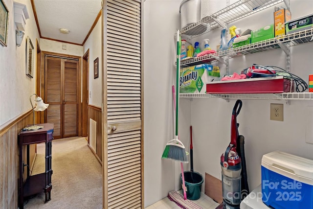 7050 W US-70 Hwy, Old Fort, NC 28762 - laundry room with wainscoting, carpet flooring, wooden walls, and a textured ceiling