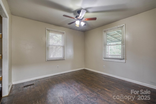 1036 20th St NE, Hickory, NC 28601 - unfurnished room featuring plenty of natural light, wood finished floors, ceiling fan, and baseboards