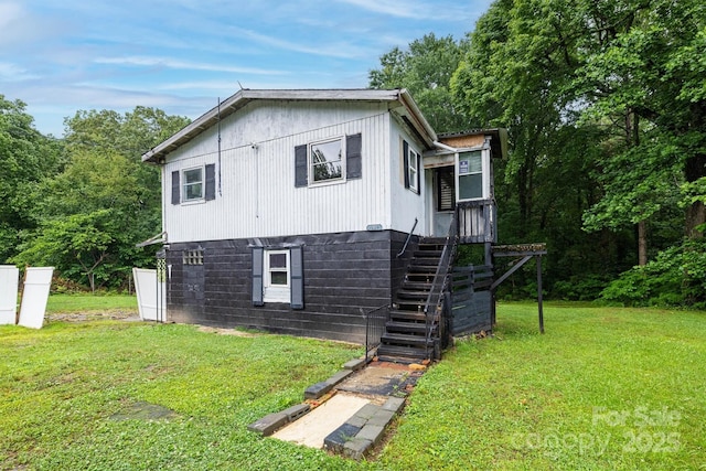 1036 20th St NE, Hickory, NC 28601 - view of side of property with a lawn and stairway