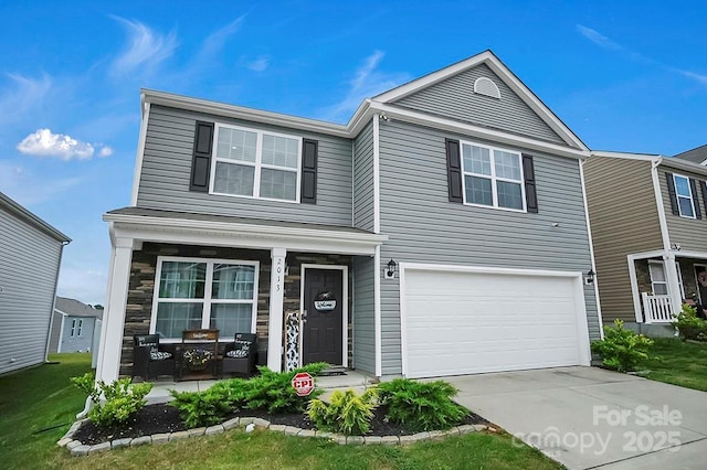2013 Eastway Dr, Dallas, NC 28034 - traditional-style home with covered porch, a garage, and driveway
