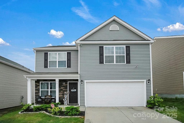 2013 Eastway Dr, Dallas, NC 28034 - traditional-style home with a garage, driveway, and covered porch