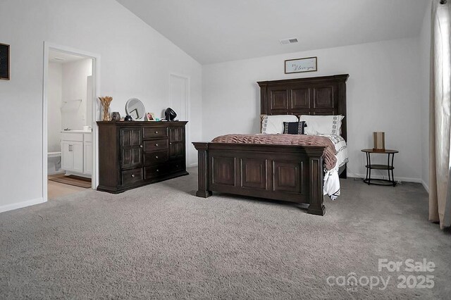 2013 Eastway Dr, Dallas, NC 28034 - bedroom with vaulted ceiling, carpet floors, ensuite bathroom, and baseboards