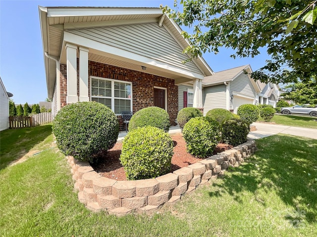 1228 Tranquil Falls Ln, Matthews, NC 28104 - view of front facade featuring brick siding and a garage