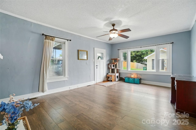 435 16th St, Cramerton, NC 28032 - foyer featuring a textured ceiling, ceiling fan, crown molding, and wood finished floors