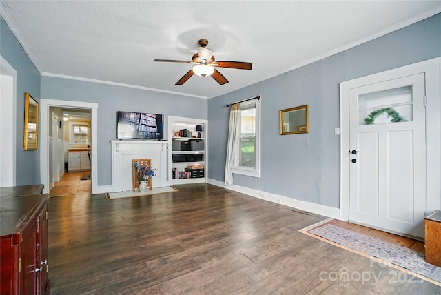 435 16th St, Cramerton, NC 28032 - unfurnished living room featuring ceiling fan, wood finished floors, crown molding, and a textured ceiling