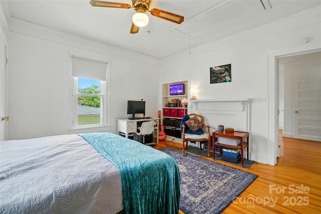 435 16th St, Cramerton, NC 28032 - bedroom featuring attic access, wood finished floors, and a ceiling fan