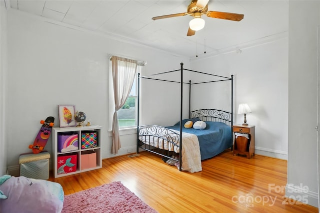 435 16th St, Cramerton, NC 28032 - bedroom featuring multiple windows, wood finished floors, ceiling fan, and ornamental molding