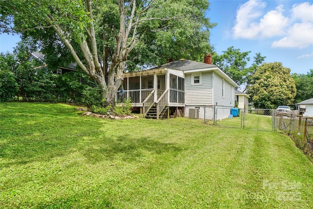 435 16th St, Cramerton, NC 28032 - rear view of house with a gate, a sunroom, a chimney, and a fenced backyard