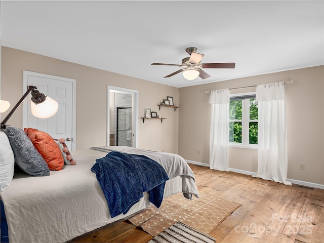 71 Midnight Ln, Waynesville, NC 28786 - bedroom featuring light wood-style floors, baseboards, and a ceiling fan