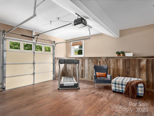 71 Midnight Ln, Waynesville, NC 28786 - exercise room featuring wood finished floors, wooden walls, and a garage
