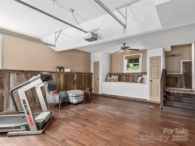 71 Midnight Ln, Waynesville, NC 28786 - workout room with wood finished floors, a wainscoted wall, and a ceiling fan