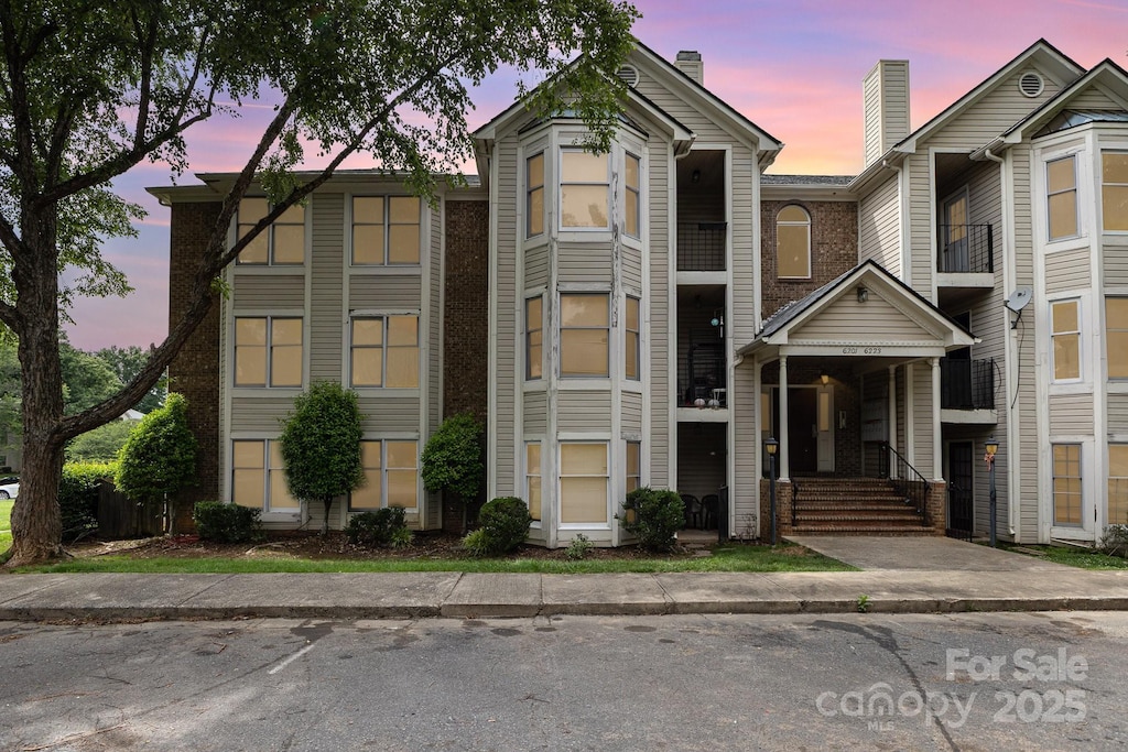 6203 Rosecroft Dr, Charlotte, NC 28215 - view of front of house featuring a chimney