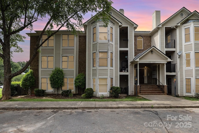 6203 Rosecroft Dr, Charlotte, NC 28215 - view of front of house featuring a chimney