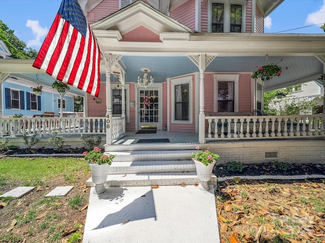408 S Ellis St, Salisbury, NC 28144 - view of exterior entry featuring a porch