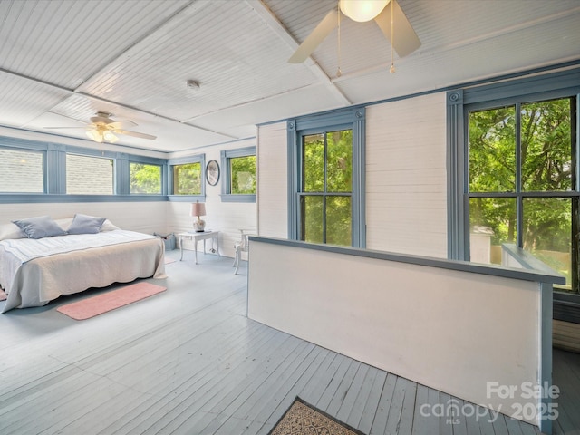 408 S Ellis St, Salisbury, NC 28144 - bedroom with multiple windows and wood finished floors
