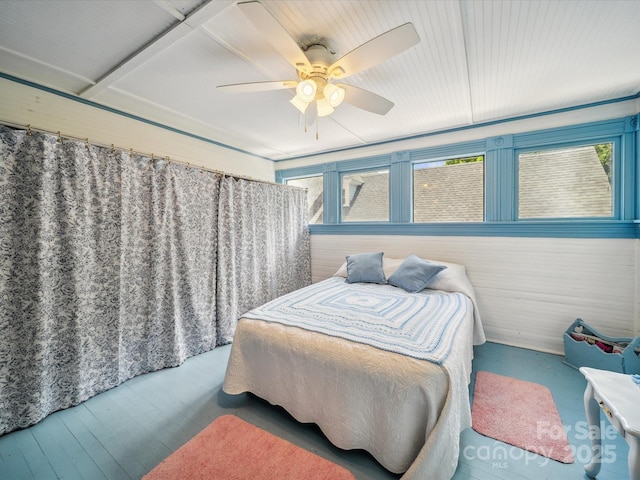 408 S Ellis St, Salisbury, NC 28144 - bedroom with multiple windows, wood finished floors, and a ceiling fan