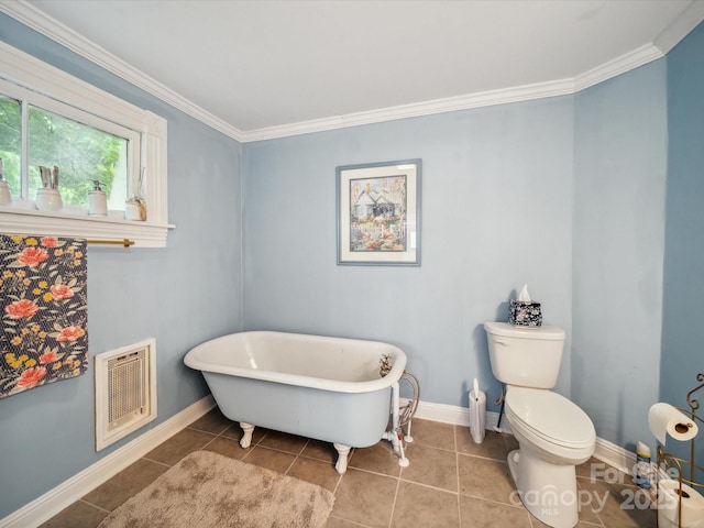 408 S Ellis St, Salisbury, NC 28144 - bathroom with a freestanding tub, tile patterned flooring, heating unit, and ornamental molding