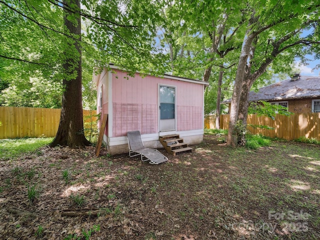 408 S Ellis St, Salisbury, NC 28144 - view of outbuilding featuring entry steps and a fenced backyard