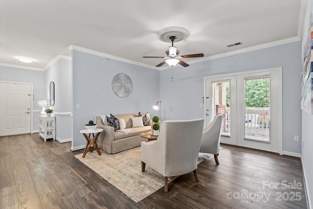 11911 Ridgeway Park Dr, Charlotte, NC 28277 - living area with wood finished floors, ceiling fan, crown molding, and baseboards