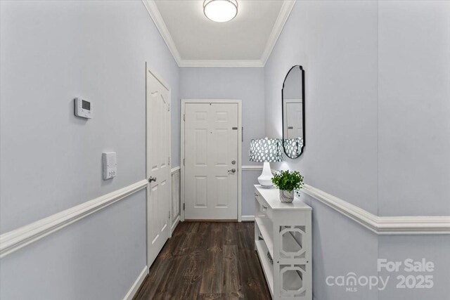 11911 Ridgeway Park Dr, Charlotte, NC 28277 - doorway to outside featuring ornamental molding, dark wood-type flooring, and baseboards