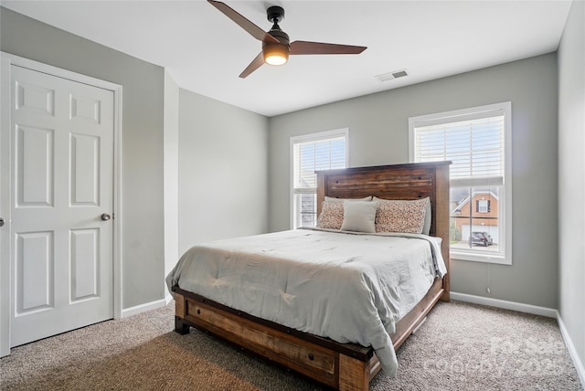 1522 Napa St NW, Concord, NC 28027 - bedroom featuring carpet, baseboards, and a ceiling fan