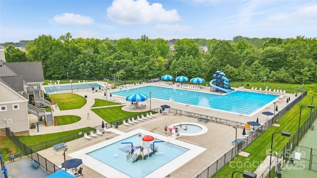 1522 Napa St NW, Concord, NC 28027 - community pool with a water slide and a water play area