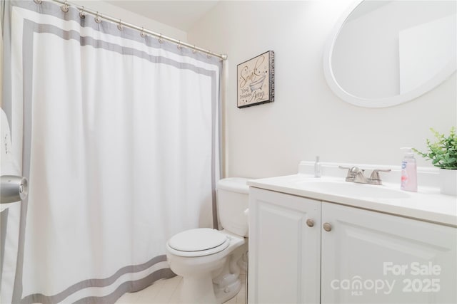 3615 Maple Glenn Ln, Charlotte, NC 28226 - full bathroom featuring toilet, vanity, tile patterned floors, and a shower with shower curtain