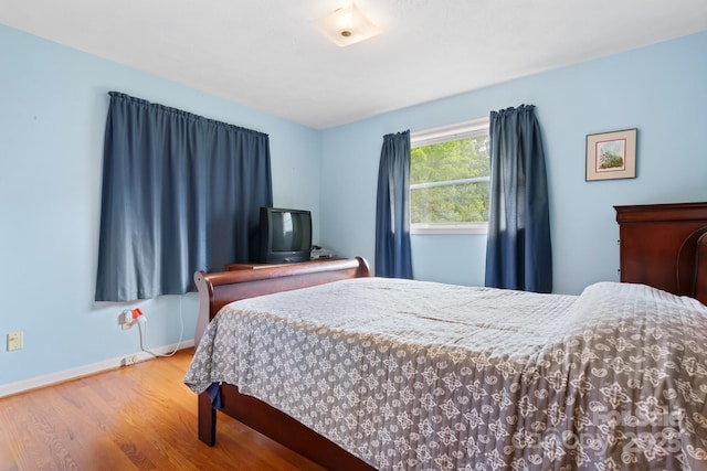 518 W School St, Maiden, NC 28650 - bedroom featuring wood finished floors and baseboards