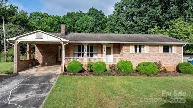 518 W School St, Maiden, NC 28650 - ranch-style house with covered porch, a chimney, a front yard, and driveway