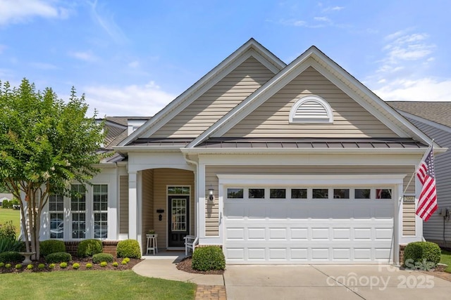 2066 Vermount Way, Indian Land, SC 29707 - view of front of property featuring driveway, a front lawn, a standing seam roof, an attached garage, and a metal roof