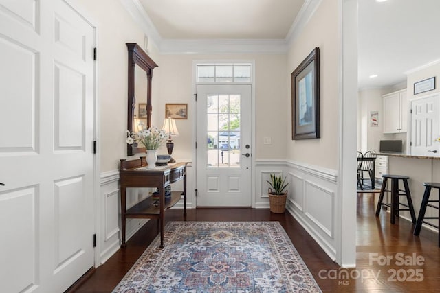 2066 Vermount Way, Indian Land, SC 29707 - foyer with a decorative wall, crown molding, a wainscoted wall, and dark wood finished floors