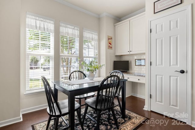 2066 Vermount Way, Indian Land, SC 29707 - dining room featuring healthy amount of natural light, dark wood-style floors, ornamental molding, and built in desk