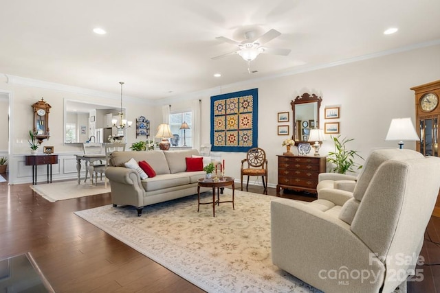 2066 Vermount Way, Indian Land, SC 29707 - living room featuring ceiling fan, ornamental molding, wood finished floors, recessed lighting, and a chandelier