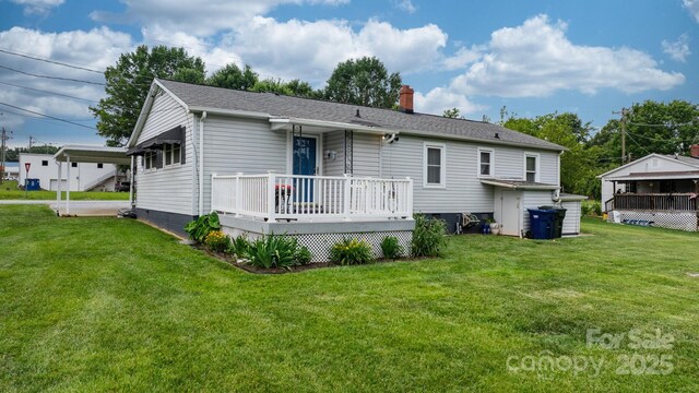 1266 18th St NE, Hickory, NC 28601 - back of house featuring a chimney, a deck, and a yard