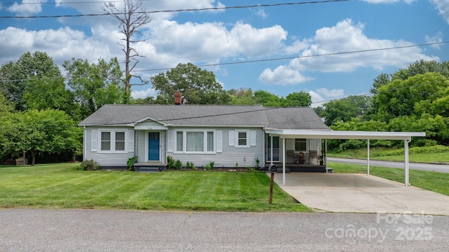 1266 18th St NE, Hickory, NC 28601 - ranch-style house featuring a front yard, concrete driveway, and an attached carport