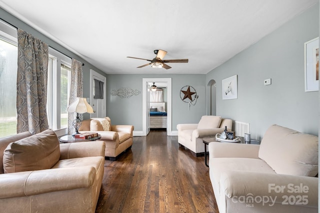 1266 18th St NE, Hickory, NC 28601 - living room featuring ceiling fan, dark wood finished floors, baseboards, and arched walkways