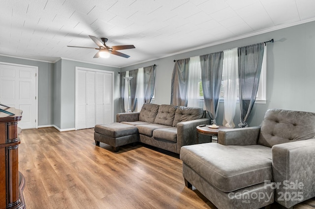 1266 18th St NE, Hickory, NC 28601 - living area with ceiling fan, ornamental molding, wood finished floors, and baseboards