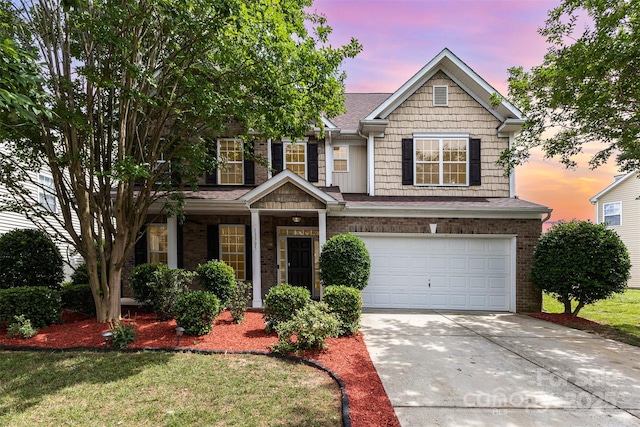 13305 Mallard Landing Rd, Charlotte, NC 28278 - view of front facade with concrete driveway, an attached garage, brick siding, and a lawn